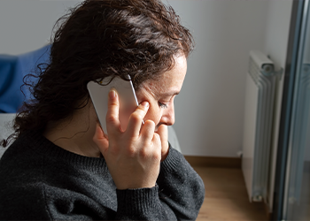 A person talking on the phone
