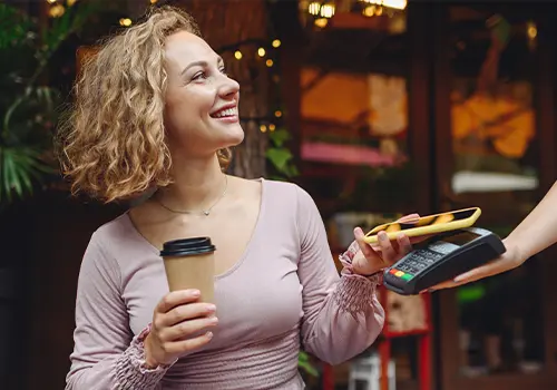 Someone paying with a mobile wallet