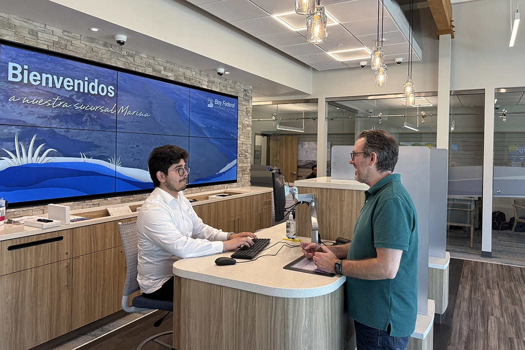 A satisfied member transacting with an MSR