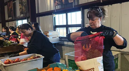 Employees packing food