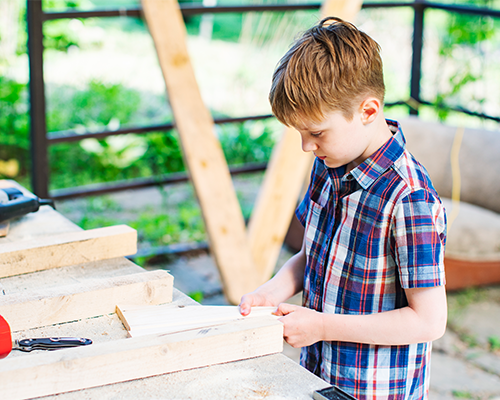 A child helping with a building project